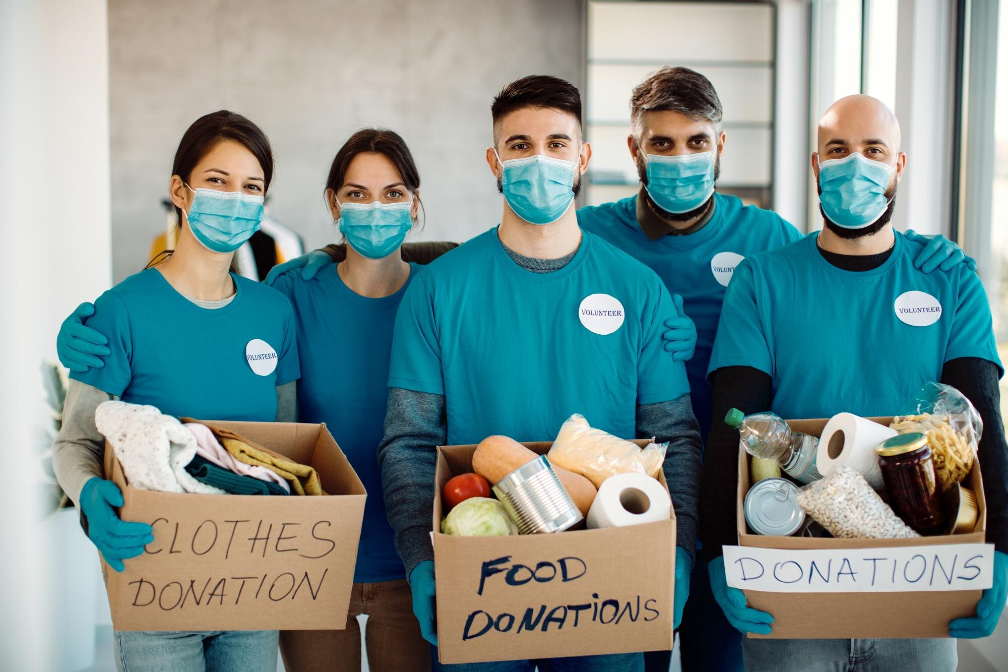 Clinical workers helping youth in overseas village clinic