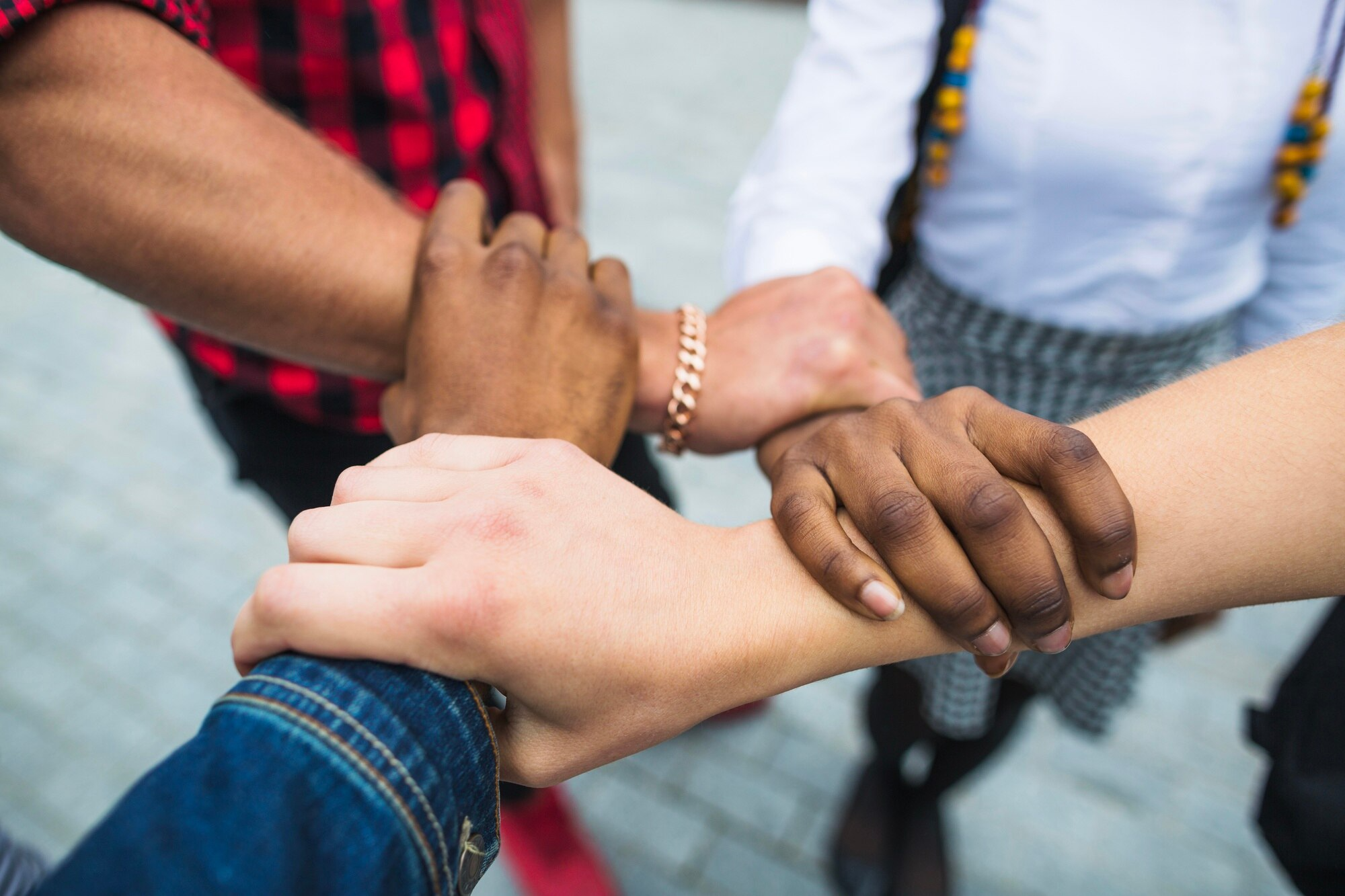 Hands joined together in partnership